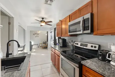 Image de 4 Bedroom | Jacuzzi | Location | Outdoor Dining