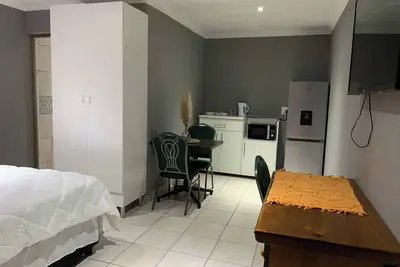 Image de Vue sur la plage, chambre avec salle de bain attenante