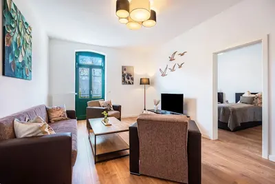 Image de Appartement 6 avec terrasse privée, jardin commun et Wi-Fi