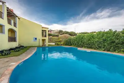 Image de Joli appartement pour 4 personnes avec climatisation, piscine, internet et Tv, près de Porto Torres