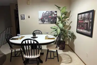 Image de Cozy Getaway: 2-Story Bungalow in Taber: Old-Fashioned Charm with big trees.