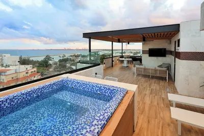 Image de Lujoso Pent-House frente a la Playa de Boca Chica de 4 Habitaciones con Terraza