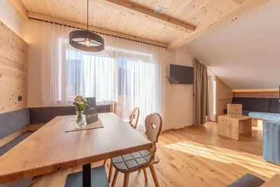 Image de Ferme 'Metzgermayr Apt Dolomit' avec vue sur les montagnes, jardin partagé et Wi-Fi
