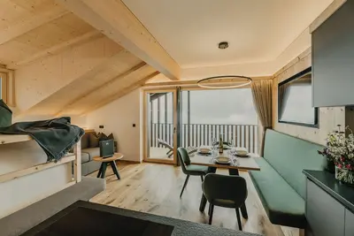 Image de Appartement \"Gipfeltraum\" avec vue sur les montagnes, jardin partagé et Wi-Fi
