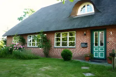 Image de Maison de vacances 'Osterdeich' avec terrasse privée, jardin privé et Wi-Fi