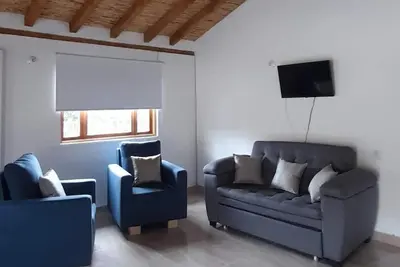 Image de Cabin with view of the mountains and the city, ideal for families and couples.