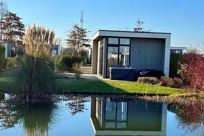 Image de Holiday Home 55 located directly to the lake