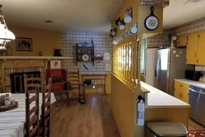 Image de Inks Lake Vacation Home with wonderful water location. Beach & dock.