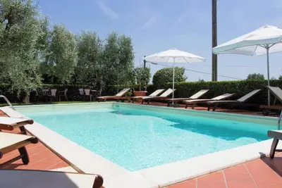 Image de Appartement \"Estate\" avec piscine partagée, Wi-Fi et climatisation
