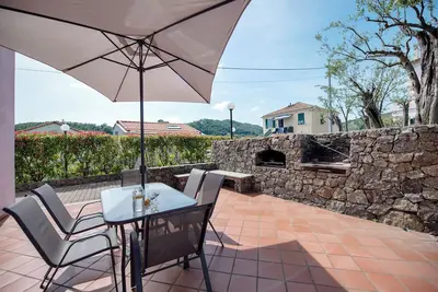 Image de Appartement 'Zafferano Suites - Mirto' avec vue sur la mer, terrasse privée et Wi-Fi