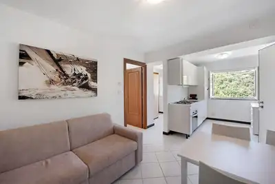 Image de Appartement 'Zafferano Suites - Origano' avec vue sur la mer, jardin partagé et Wi-Fi