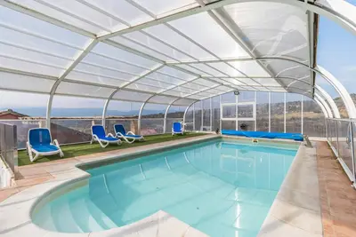 Image de Appartement 'Las Planeras' avec vue sur la montagne, piscine partagée et Wi-Fi