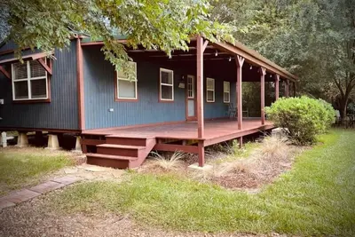Image de Cozy cabin in nestled on 9-acre lot in Summit, Ms