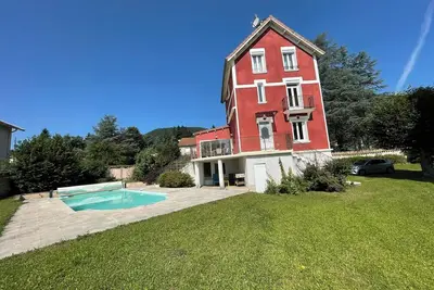 Image de La Maison Fleuri - Qouei Eichi - Piscine, Wifi, Familial