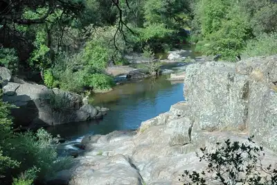 Image de Private 40-acre retreat with creek, swimming hole, hot tub, fire pit, sleeps 18, dog-friendly, near golf & casinos.