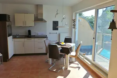 Image de Modern vacation apartment with south-facing balcony, direct beach location