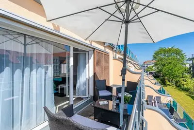 Image de Bright vacation apartment with large south-facing balcony, just a few meters from the beach