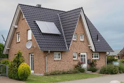 Image de Spacious vacation home with fenced garden, terrace and sauna, close to the beach