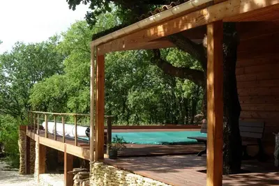 Image de Maison bois avec piscine privée et Wifi, animaux admis