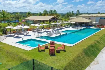 Image de Sophisticated Bungalow with 2 suites facing the sea and 5 minutes from the river in Imbassaí