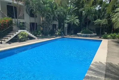 Coco Beach Condo - Steps to the Beach