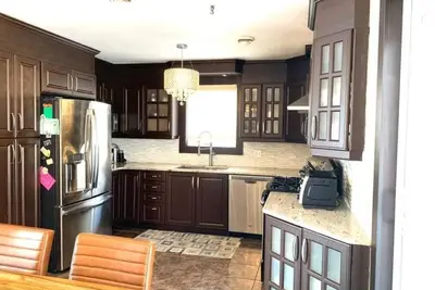 Image de Charming 3-bedroom house with Fireplace  and Outdoor Pool in welcoming Montréal