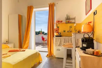 Image de VillaSalentu. it, Lu Sule with a huge terrace overlooking the sea, sky, land.