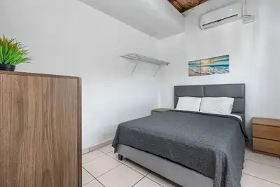 Beach Access Escape with Pool and Tanning Lounges