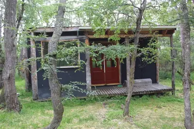 Image de Charming 2 bedroom cabin nestled in the woods just outside of Puerto Natales.