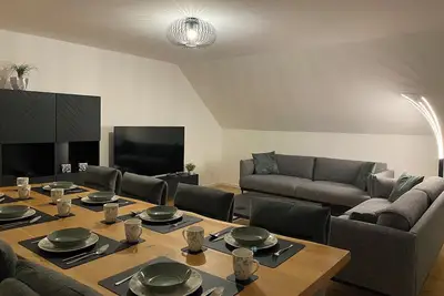 Image de Spacious vacation apartment for up to 8 people, within walking distance of the center.