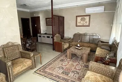 Image de Spacious 3-bedroom apartment, 3 seating areas, in charming Amman with Ac, WiFi