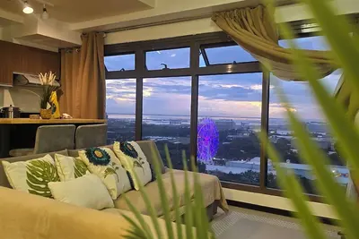 Image de 59sq/m Spacious and Safe condo+free parking+Manila Bay Sunset view/WiFi&NetFlx