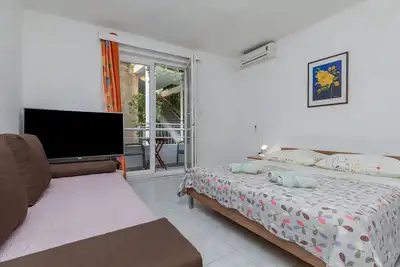 Image de Appartement d'une chambre prés de la plage Igrane, Makarska (A-23620-a)