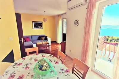 Appartement de vacances avec balcon et vue sur la mer, à seulement 300 mètres de la plage