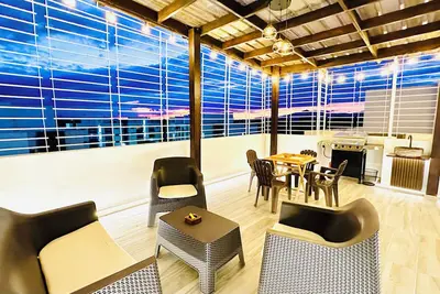 Image de Spacious 3-bedroom apartment with private terrace, pool, Ac, WiFi and more