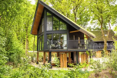 Image de Experience pure tranquility and wellness in the Nature Villa with a private hot tub and two stylish suites for four guests.