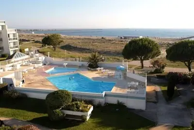 Image de Appartement 3 pièces pour 6 avec piscine, Wifi, et parking à Port Camargue