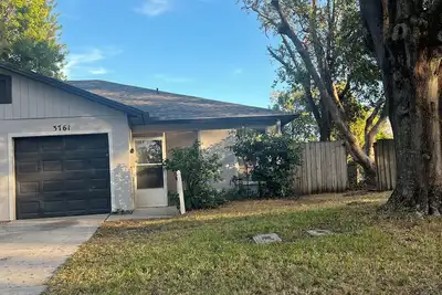 Image de Beach theme 2-bed villa WiFi in Palm Harbor Honeymoon Island Pinellas trail