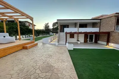 Image de Charming 3-bedroom apartment in quaint S'Ena e Sa Chitta with large garden