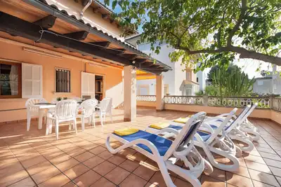 Image de Cas Caminer. Comfortable townhouse 50 meters from the sandy beach.