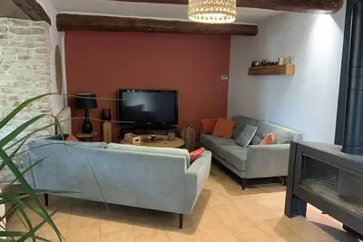 Image de Grange rénovée avec coeur, et une décoration soignée par la maitresse de maison,