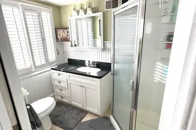 Image de The view of the beach from the penthouse deck  resort with Ac in charm Salisbury