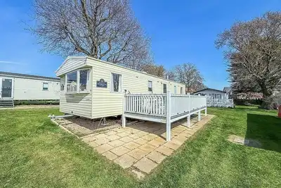 Homely caravan with decking at Valley Farm Holiday Park, sleeps 8 ref 46713v