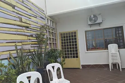 Image de Two bedroom apartment with an outdoor balcony area facing the Mekong River.
