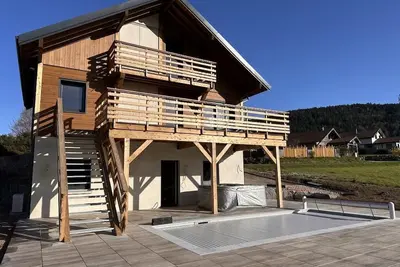 Image de Chalet Plume D'Eau - 11 pers - Piscine/Petanque/Baby-Foot - à 10min de Gerardmer
