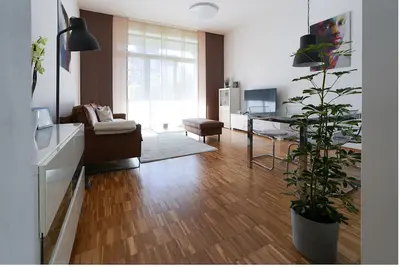 Image de 2 room loft apartment with garden and parking space