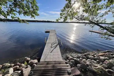 Image de Fun lake cabin. WiFi, Ac. Kayak, sup boards all the things you need to relax.