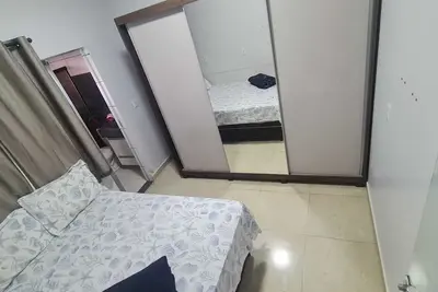 Image de Cozy room with suite in a house in Setor Goiânia 2, Goiânia for families.