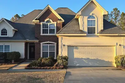 Image de Belle maison 4 chambres, 3 Sdb, bureau, WiFi gratuit. Dispo pour Masters 2025.