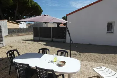 Image de Maison conviviale à 500m de la plage, animaux admis, terrasse et WiFi